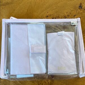 Beis pink passport and luggage tag set new in plastic travel pouch.